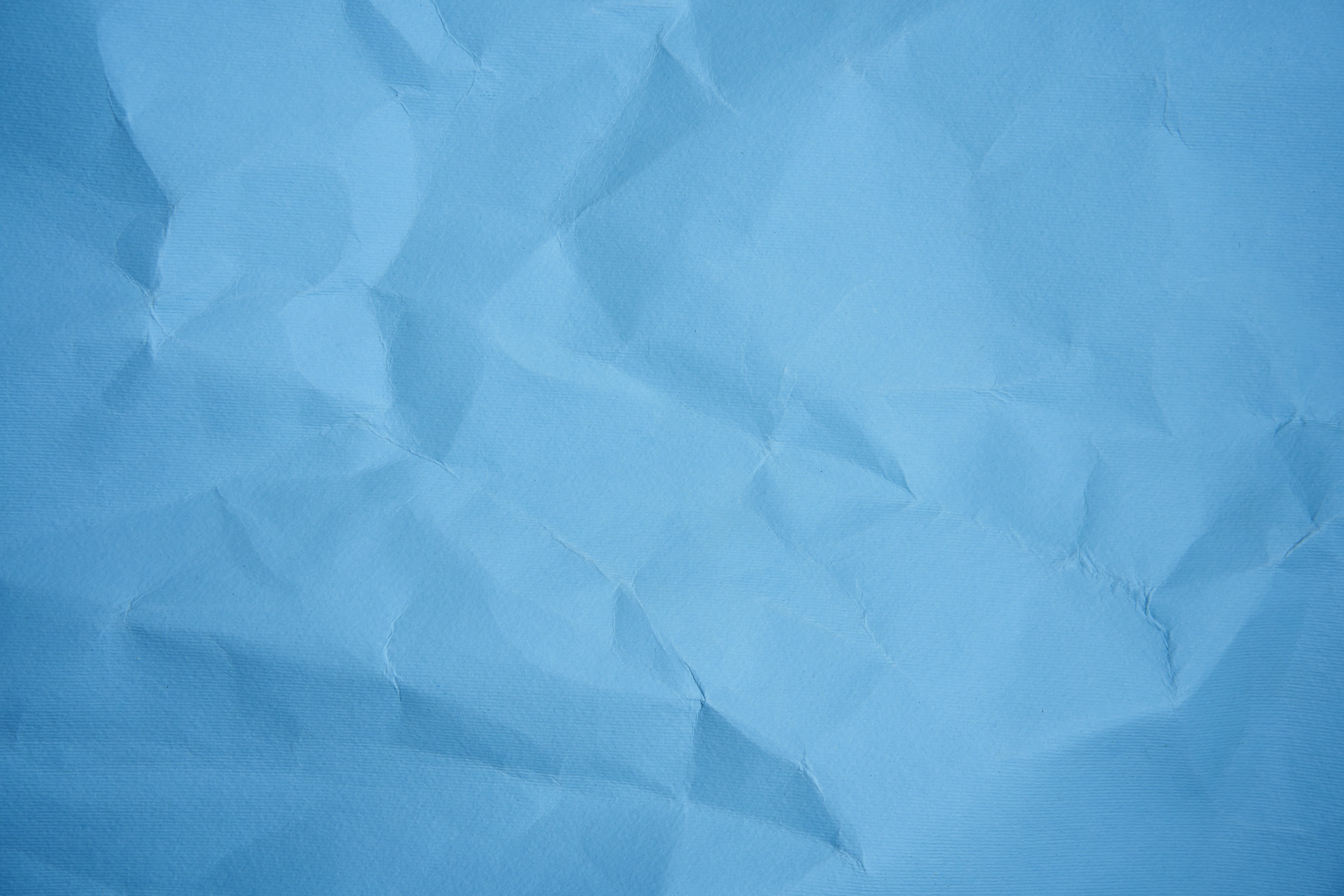 Crumbled Blue Paper as a Background